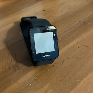 Garmin Forerunner 30 Gray band, black face.